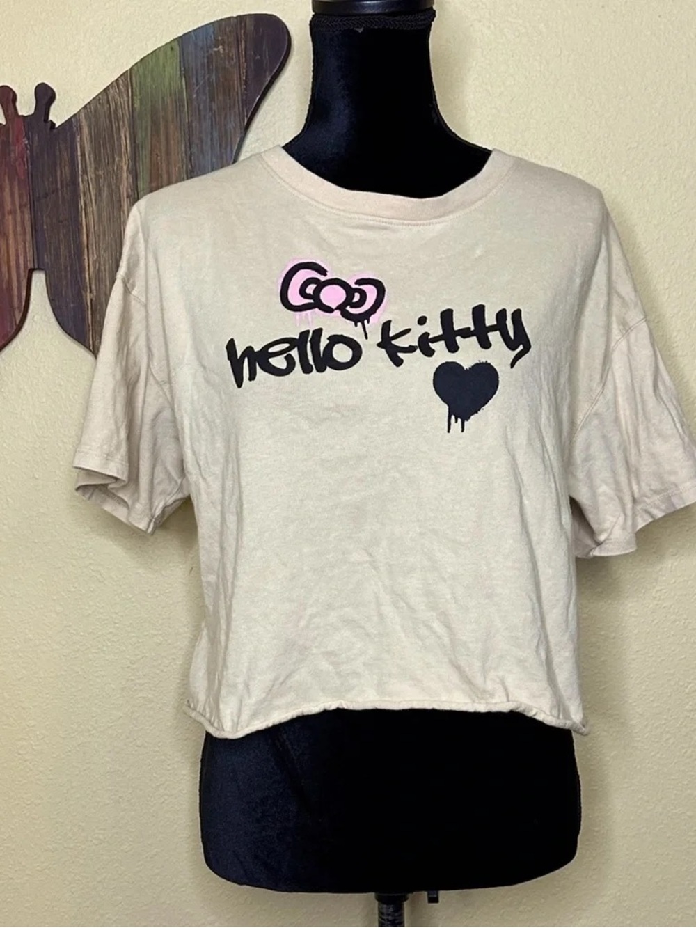 Hello Kitty Cream Short Sleeve Graphic Tee with Pink Bow Accent